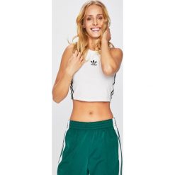 Adidas Originals - Top. Białe topy damskie marki adidas Originals, z elastanu, z okrągłym kołnierzem. Za 129,90 zł.