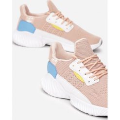 Różowe Buty Sportowe Corderia. Różowe buty sportowe damskie Renee, bez wzorów, sportowe. Za 89,99 zł.