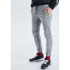Jeansy Slim Jogger - Jasny szary. Szare jeansy męskie marki Cropp, m, bez wzorów. Za 139,99 zł.