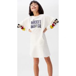 Mango Kids - Sukienka dziecięca Sk 110-164 cm. Białe sukienki dziewczęce Mango Kids, z aplikacjami, z bawełny, z długim rękawem, długie, mini, rozkloszowane. Za 99,90 zł.