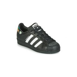 Buty Dziecko adidas SUPERSTAR J. Czarne trampki dziewczęce Adidas, bez wzorów, bez zapięcia. Za 309,00 zł.