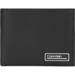 Calvin Klein Portfel Czarny. Czarne portfele męskie Calvin Klein, bez wzorów, ze skóry. Za 290,95 zł.