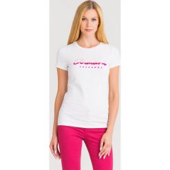 T-SHIRT ARMANI EXCHANGE. Białe t-shirty damskie Armani Exchange, s, z aplikacjami, z bawełny, z okrągłym kołnierzem. Za 259,00 zł.