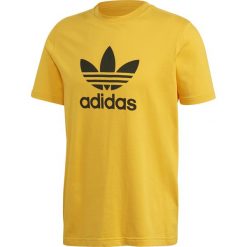 MĘSKA KOSZULKA ADIDAS TREFOIL (L). Żółte koszulki męskie Adidas, m, bez wzorów, z bawełny, klasyczne, bez kołnierzyka, bez rękawów. Za 99,99 zł.