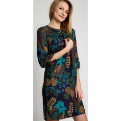 Prosta sukienka z wiskozy z podwijanymi rękawami RABARBAR. Żółte sukienki damskie RABARBAR, na co dzień, bez wzorów, z wiskozy, eleganckie, bez kołnierzyka, bez rękawów, proste. W wyprzedaży za 227,00 zł.