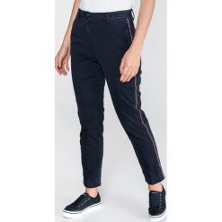 Tommy Hilfiger Dennis Spodnie Niebieski. Niebieskie spodnie damskie TOMMY HILFIGER, xs, z elastanu. Za 521,95 zł.