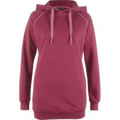 Długa bluza z wpuszczanymi kieszeniami bonprix magenta. Fioletowe bluzy damskie bonprix, bez wzorów, z długim rękawem, długie, bez kaptura. Za 49,99 zł.