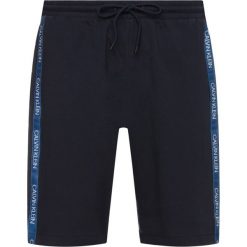 Szorty sportowe Calvin Klein Swimwear KM0KM00466. Szare spodenki sportowe męskie Calvin Klein Swimwear, m, bez wzorów, z bawełny, sportowe. Za 199,00 zł.