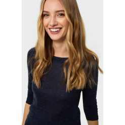 Sweter o dopasowanym kroju. Swetry damskie Greenpoint, bez wzorów, z wełny, bez rękawów, bez kaptura. Za 79,99 zł.