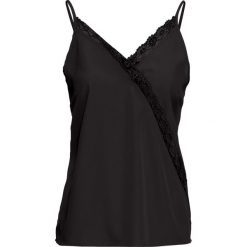 Top z koronką bonprix czarny. Czarne bluzki damskie bonprix, w koronkowe wzory, z koronki, z dekoltem w serek. Za 74,99 zł.