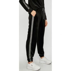 Dkny - Spodnie. Czarne spodnie damskie DKNY, s, bez wzorów, z elastanu, casualowe. W wyprzedaży za 219,90 zł.