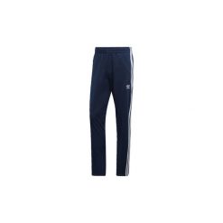 Spodnie treningowe adidas Spodnie dresowe Firebird. Niebieskie spodnie męskie Adidas, s, bez wzorów, z dresówki. Za 249,00 zł.