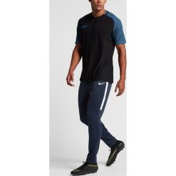 Nike - Spodnie. Niebieskie spodnie męskie Nike, s, bez wzorów, z poliesteru. Za 229,90 zł.
