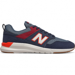 New Balance MS009RG1. Pomarańczowe buty sportowe męskie New Balance, z gumy, bez zapięcia. Za 279,99 zł.
