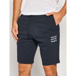 Szorty sportowe Peak Performance Ground G66046064. Niebieskie spodnie męskie Peak Performance, s, bez wzorów, z bawełny, sportowe. Za 249,00 zł.