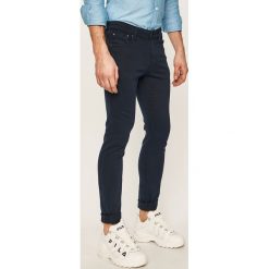 Jack & Jones - Spodnie. Niebieskie spodnie męskie Jack & Jones, bez wzorów, z elastanu. W wyprzedaży za 149,90 zł.