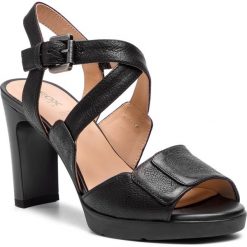 Sandały GEOX - D Annya H.Sand B D92CLB 0009D C9999 Black. Czarne klapki damskie Geox, bez wzorów, ze skóry, bez obcasa, na obcasie. W wyprzedaży za 429,00 zł.