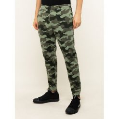 Spodnie dresowe Calvin Klein Performance Knit Pants 00GMH9P683. Zielone jeansy męskie Calvin Klein Performance, m, bez wzorów, z bawełny. Za 399,00 zł.