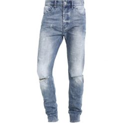 Cristiano Ronaldo CR7 TYPE T WORN & REPAIR Jeansy Zwężane ocean spray. Niebieskie jeansy męskie marki Cristiano Ronaldo CR7. Za 379,00 zł.