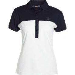 J.LINDEBERG CARIN TORQUE Koszulka sportowa white. Białe topy sportowe damskie marki J.LINDEBERG, s, z poliesteru, polo. Za 339,00 zł.