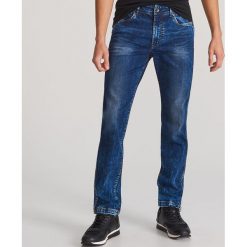 Spodnie jeansowe slim - Granatowy. Niebieskie spodnie męskie Reserved, m, bez wzorów, z jeansu. Za 149,99 zł.