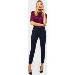 Eleganckie spodnie o klasycznym kroju. Spodnie damskie Greenpoint, z elastanu. Za 119,99 zł.