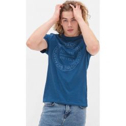 T-shirt z nadrukiem - Niebieski. Niebieskie t-shirty damskie House, s, z nadrukiem, bez kołnierzyka. Za 39,99 zł.