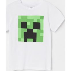 Bawełniany t-shirt Minecraft - Biały. Białe t-shirty męskie Reserved, bez wzorów, z bawełny, bez kołnierzyka. Za 49,99 zł.