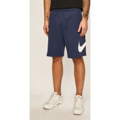 Nike Sportswear - Szorty. Niebieskie spodenki sportowe męskie Nike Sportswear, m, z nadrukiem, z bawełny, sportowe. W wyprzedaży za 129,90 zł.