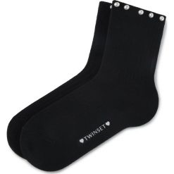 Skarpety Wysokie Damskie TWINSET - Calzino 192TA432B Nero 00006. Czarne skarpetki damskie Twinset, bez wzorów, z elastanu. W wyprzedaży za 189,00 zł.