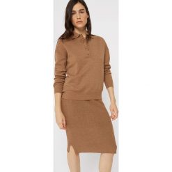 Koszulka polo w kolorze jasnobrązowym. Pomarańczowe koszulki damskie Rodier, s, z wełny, klasyczne, polo. W wyprzedaży za 209,95 zł.