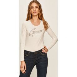 Guess Jeans - Longsleeve. Czarne bluzki damskie Guess Jeans, s, z aplikacjami, z bawełny, casualowe, z okrągłym kołnierzem. Za 219,90 zł.