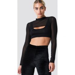 Galore x NA-KD Siateczkowy top Two In One - Black. Czarne topy damskie marki Galore x NA-KD, bez wzorów, z podwójnym kołnierzykiem. W wyprzedaży za 50,47 zł.