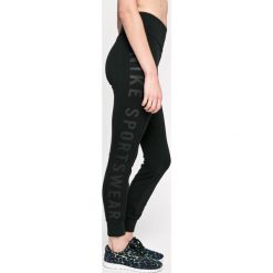 Nike Sportswear - Legginsy. Czarne legginsy damskie marki Nike Sportswear, s, z elastanu. W wyprzedaży za 139,90 zł.