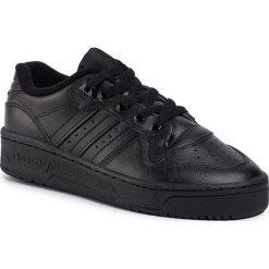 Buty adidas - Rivalry Low J EG3637 Cblack/Cblack/Ftwwht. Czarne buty sportowe damskie Adidas, bez wzorów, ze skóry ekologicznej, sportowe. W wyprzedaży za 219,00 zł.