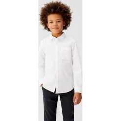 Mango Kids - Koszula dziecięca Damian6 110-164 cm. Białe koszule chłopięce z bawełny, eleganckie, długie. Za 59,90 zł.