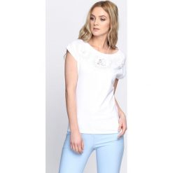 Biały T-shirt Millionaire Waltz. Białe bluzki damskie Born2be, l. Za 29,99 zł.