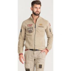 BLUZA Aeronautica Militare. Brązowe bluzy męskie Aeronautica Militare, s, z nadrukiem, z bawełny, bez kołnierzyka, bez rękawów, bez kaptura. Za 989,00 zł.