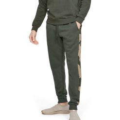 Under Armour Rival Spodnie dresowe Zielony. Zielone spodnie męskie Under Armour, s, bez wzorów, z bawełny. Za 274,95 zł.