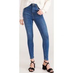 Jeansy slim z Tencelem™ - Niebieski. Niebieskie jeansy damskie Reserved. Za 119,99 zł.
