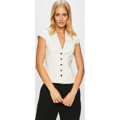 Marciano Guess - Top. Białe bluzki damskie MARCIANO GUESS, z aplikacjami, z elastanu, bez kołnierzyka, z krótkim rękawem. W wyprzedaży za 579,90 zł.