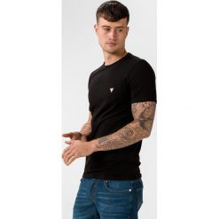 Guess Core Koszulka Czarny. Czarne podkoszulki męskie Guess, l, z aplikacjami, z elastanu, z krótkim rękawem. Za 114,95 zł.