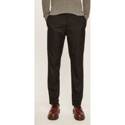 Calvin Klein - Spodnie. Czarne spodnie męskie Calvin Klein, na co dzień, bez wzorów, z elastanu. Za 539,90 zł.