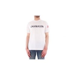 T-shirty z krótkim rękawem Calvin Klein Jeans J30J311463. Białe t-shirty męskie Calvin Klein Jeans, s, bez wzorów, z jeansu, bez kołnierzyka, krótkie. Za 194,99 zł.