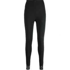 Legginsy Punto di Roma z kolekcji Maite Kelly bonprix czarny. Czarne spodnie damskie bonprix, w paski, z koronki. Za 54,99 zł.