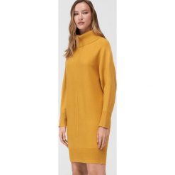 Swetrowa tunika Eco Aware -. Tuniki damskie Mohito, s, bez wzorów, bez kołnierzyka, bez rękawów. Za 139,99 zł.
