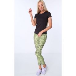 Legginsy sportowe damskie: Legginsy sportowe we wzory żółte MR15285