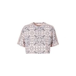 T-shirty z krótkim rękawem Converse CROPPED TEE MILEY CYRUS. Czerwone t-shirty damskie marki Converse, m. Za 139,30 zł.