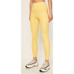 Calvin Klein Performance - Legginsy. Żółte spodnie damskie Calvin Klein Performance, s, z nadrukiem, z elastanu. Za 249,90 zł.