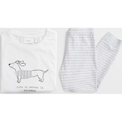 Mango Kids - Piżama dziecięca Perro 110-164 cm. Białe piżamy dziewczęce Mango Kids, z nadrukiem, z elastanu, z krótkim rękawem. Za 69,90 zł.